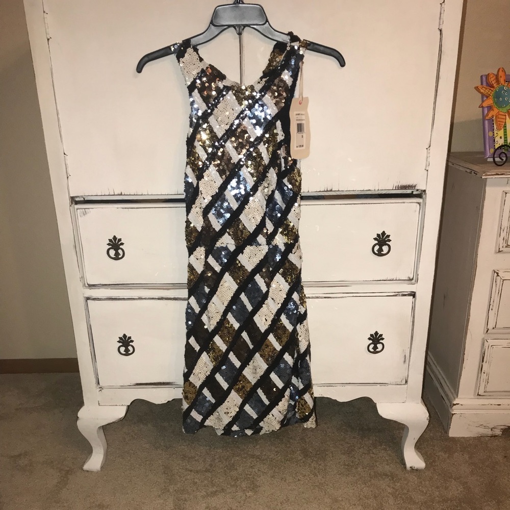 Multi colored sequined open backed dress.